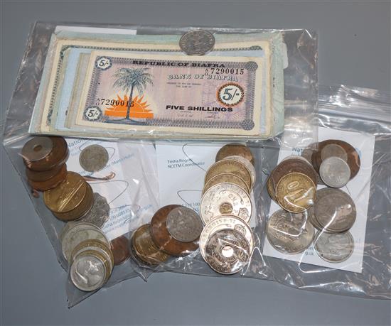 A collection of African and Egyptian currency, including Bank of Biafra banknotes,